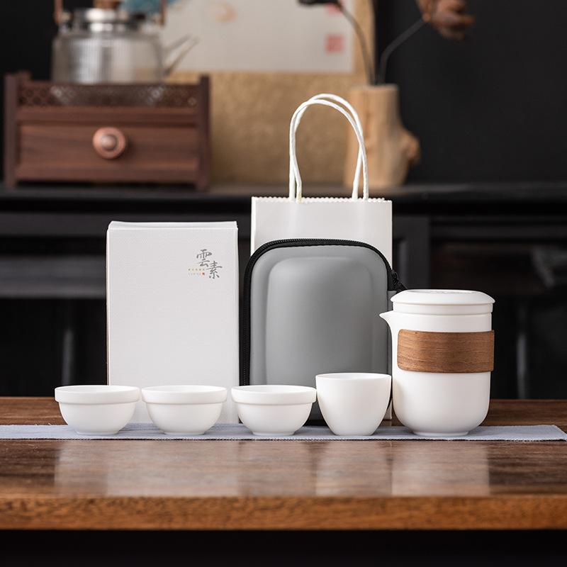 

Вегетарианский обжиг, высококачественный теплый нефритовый фарфор, дорожный чайный набор, один чайник и четыре чашки, подарочная коробка, твердый переплет, легкая роскошь, деловые подарки-компаньоны