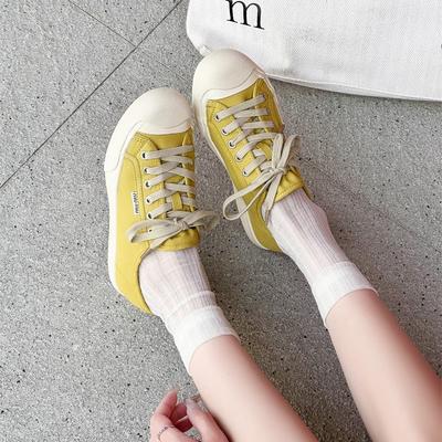 Scarpe in tela casual versatili alla moda da donna nuove a fondo piatto a taglio basso scarpe con suola morbida scarpe bianche
