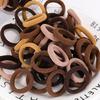 100Piece Set of High Elastic Fabric Hair Bands In Various Brown and Beige Shades