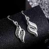 Zhenrong Geometric Hollow 925 Silver Drop Earrings with Feminine Design