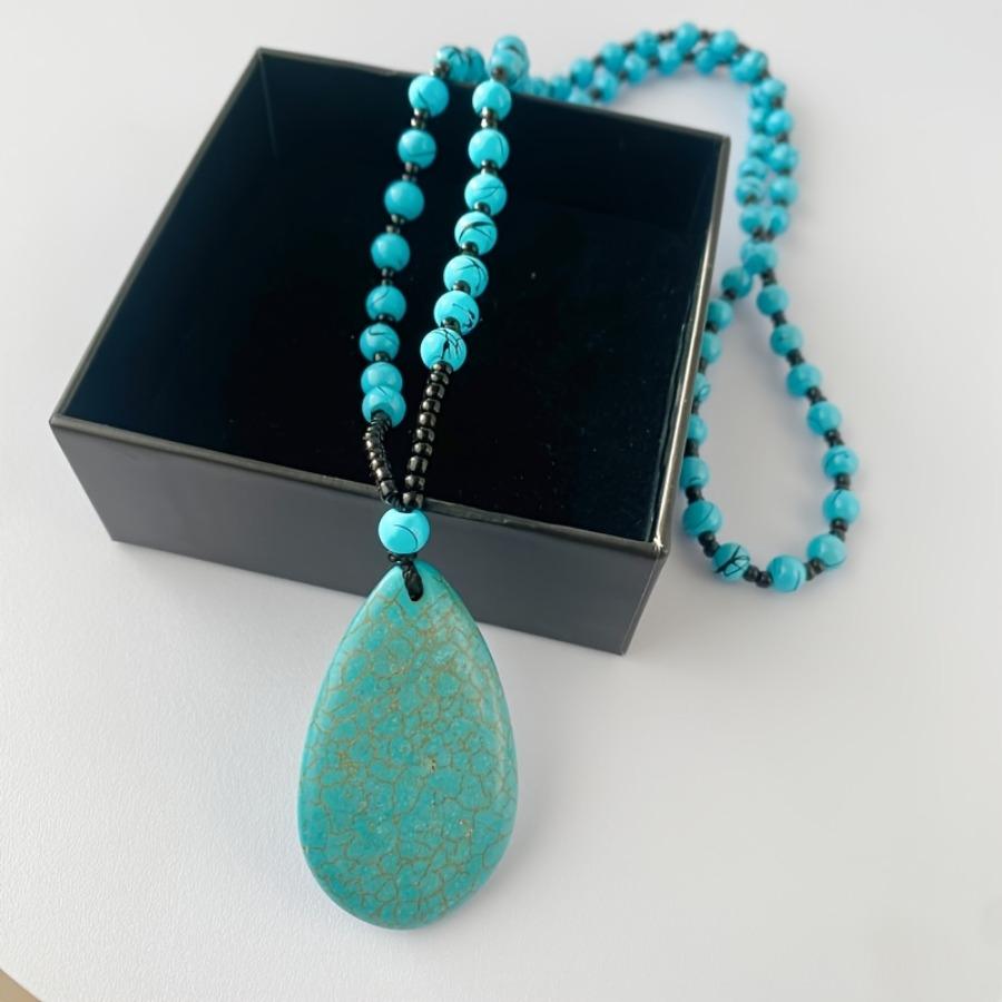 A Long Necklace Resembling Blue Turquoise with a Vintage Teardrop Pendant, Elegant And Stylish in a Bohemian Style, Perfect for Sweaters