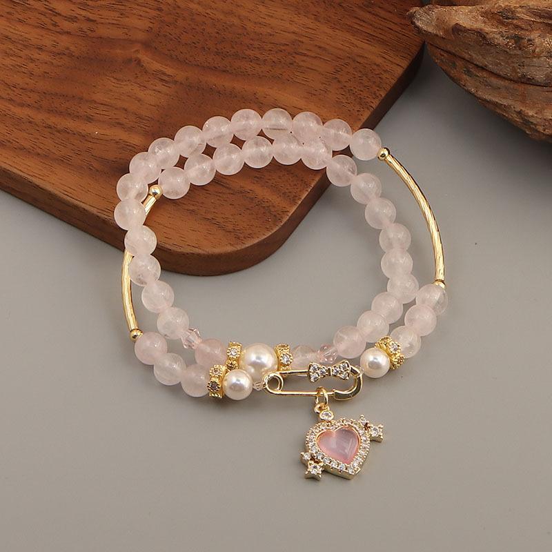Natural pink crystal Shijia pearl pink love kt cat cross bamboo joint elastic stacked bracelet bracelet