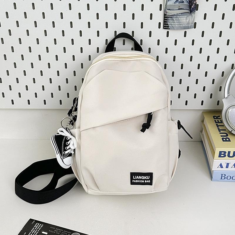 Schoolbag Korean version of simple small backpack versatile messenger bag men's casual men's sports breast bag women's large-capacity student shoulder