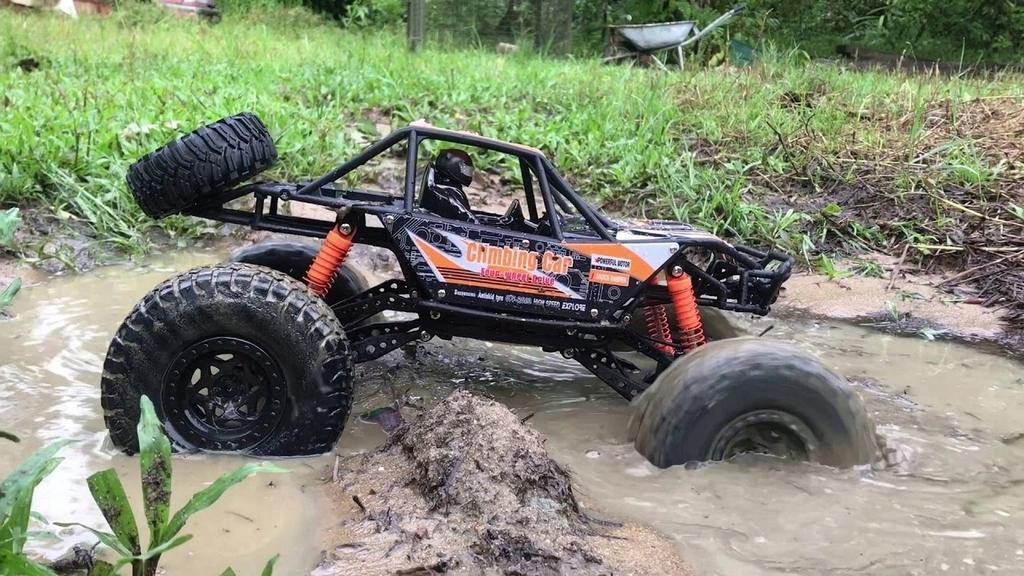 Távirányítású RC autó terepjáró nagy távirányítóval 50 cm-es 4x4 lánctalpas