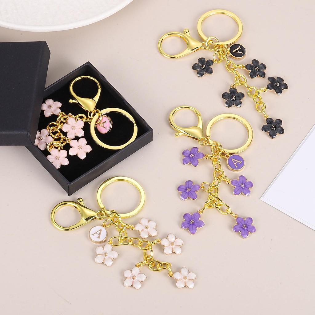 [uxcell] Set of 2 WhiteBlack Alphabet A Initial Flower Keychains for Women, Handbags, Backpacks, Wallets, and Accessories