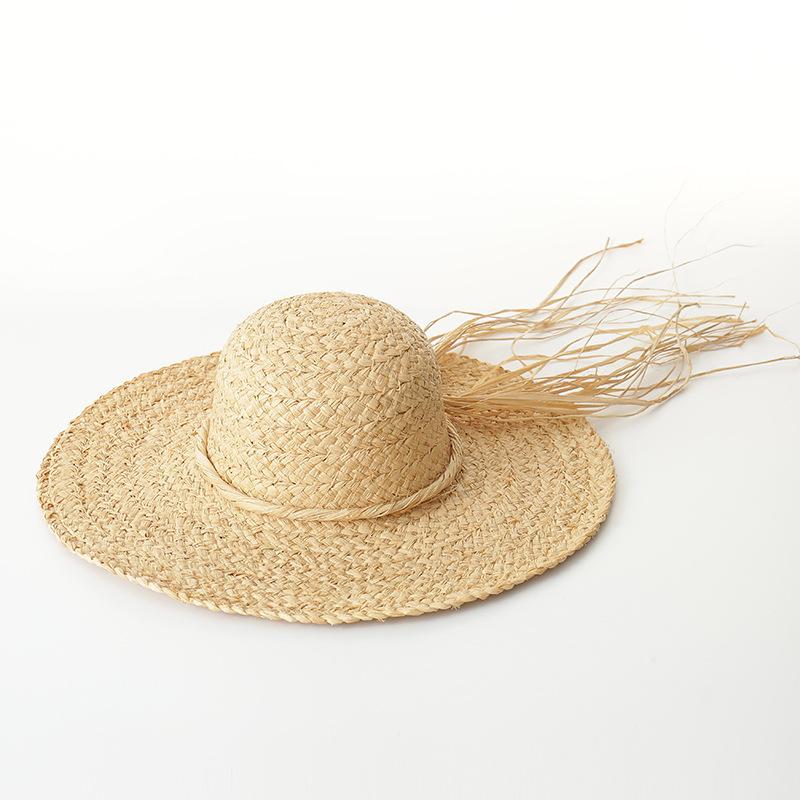 Spring and summer new versatile casual hand-woven straw hat fashionable raffia rough edge beach vacation sun protection simple sun hat