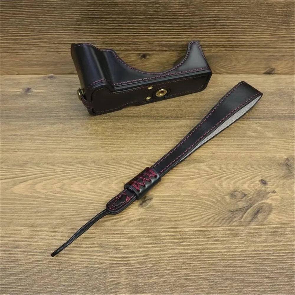 Półpokrowiec na aparat z PU skóry dla Canon EOS R50 R100, dolna pokrywa z paskiem na rękę, otwór na baterię