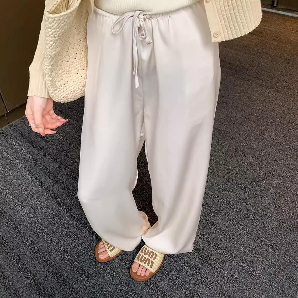 Echtes Leder Amiu's Alphabet Gras gewebte Ein-Wort-Slipper für Frauen zum Tragen Sommer neu Urlaub Strand flache Sandalen