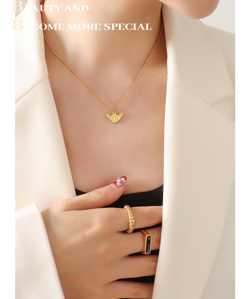 Gold-Plated Geometric Wing Pendant Necklace: Japanese-Korean Design with Titanium Steel Clavicle Chain