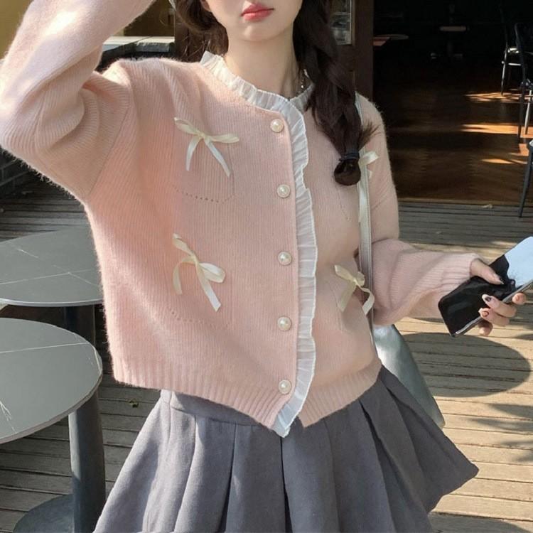 

Sweet and gentle wind pink bow knitted sweater top foreign style sweater spring sweater jacket women 2044-142 (average size) рожевий