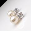 European and American fashionable women's pearl simple personality elegant creative temperament versatile niche dinner earrings