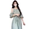 French cold feeling small daisy off-the-shoulder suspender dress women's summer new temperament socialite style loose medium and long dress