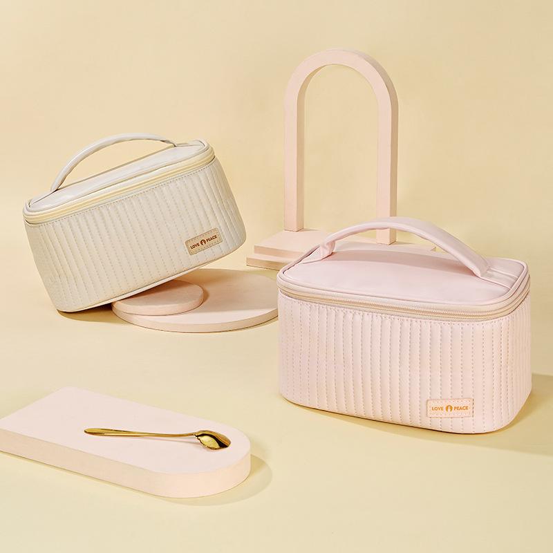Advanced Sense Cream Cake Cosmetic Bags for Female Hand Carrying Travel Makeup Storage Bag Portable PU Wash Toiletries Bag