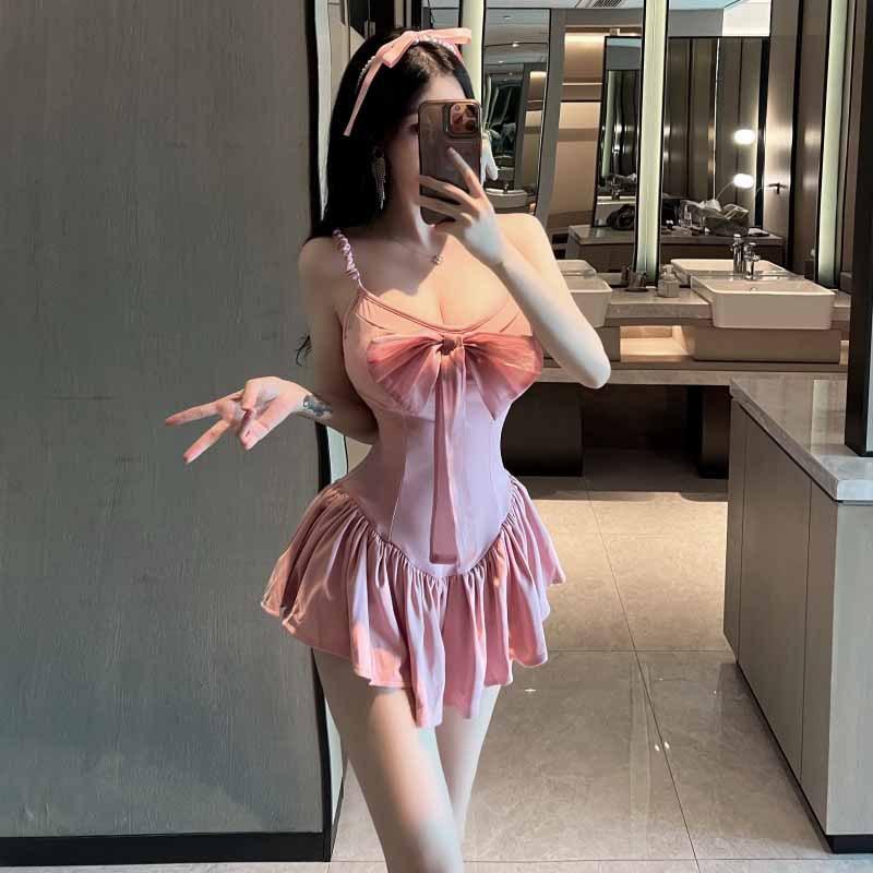 

Женское платье pure lust sweet с глубоким вырезом и большим бантом на шее L розовый