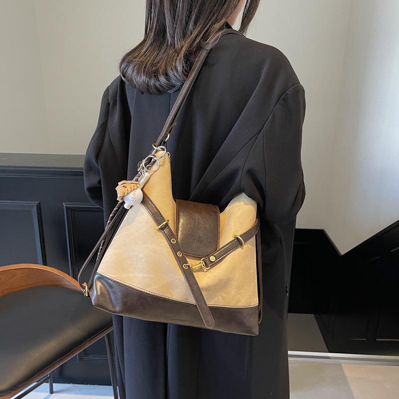 Commuter retro contrasting color large-capacity bag women's 2025 new autumn and winter shoulder messenger bag multi-purpose backpack