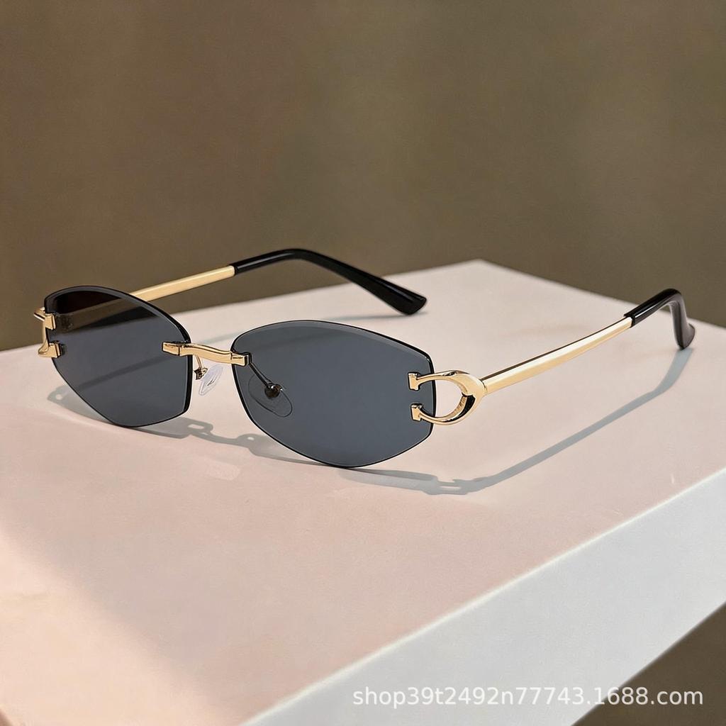 Fashion frameless sunglasses women's high-end sense high-quality European and American trendy outdoor sunglasses sunglasses women's trend spot
