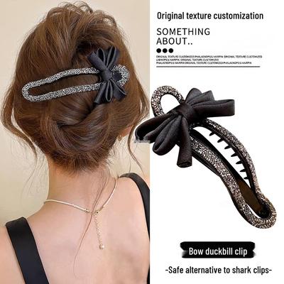 Elegante schwarze Strass-Entenschnabel-Haarspange mit Schleifendesign für einen luxuriösen Hochsteckfrisur-Look