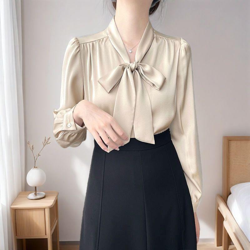 

Весна 2025 Женская блузка во французском стиле с бантом, атласная офисная рубашка с деталью из ниспадающей ленты, сексуальная элегантная одежда для работы в стиле business casual XL шампанского