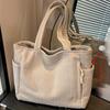 A Casual Corduroy Handbag with Zip Closure, Lightweight and Large Capacity, Fixed Shoulder Strap and Polyester Lining, Solid Everyday Commuter Handbag