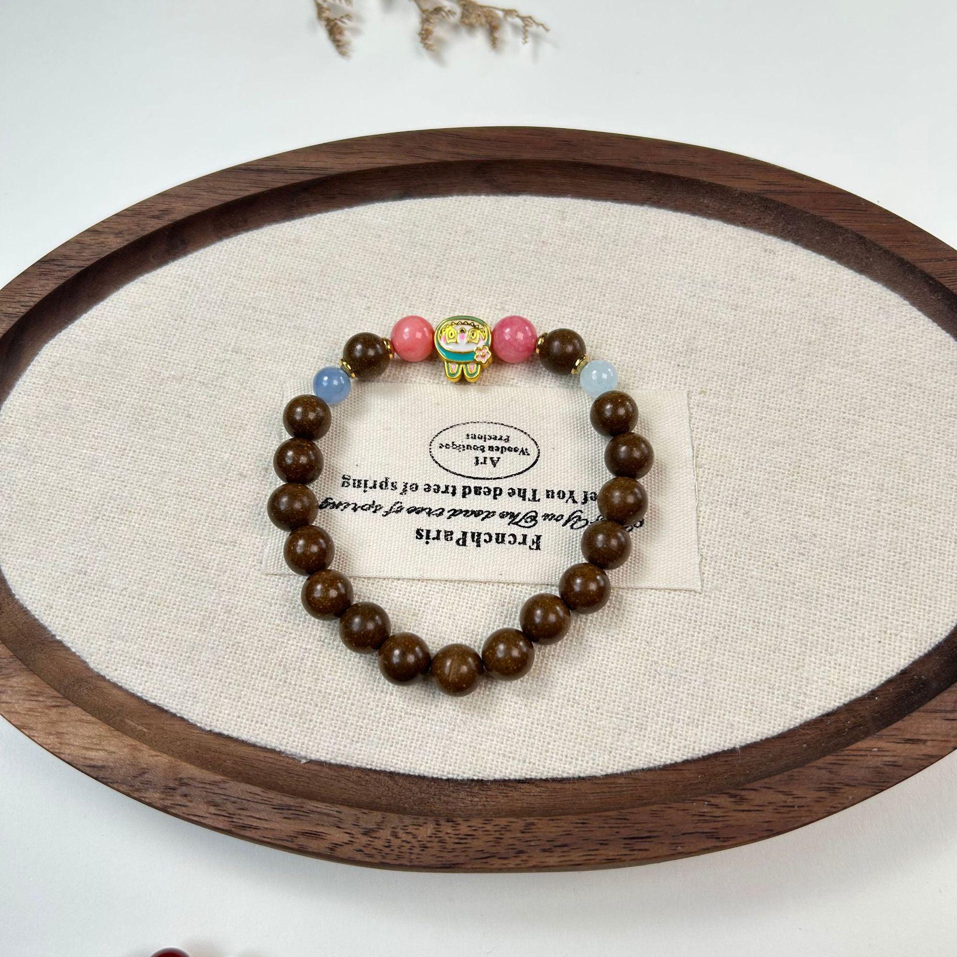 Natural Fragrance Bead Bracelet with Goose Pear, Purple Crystal, Hetian Jade, and Red Agate