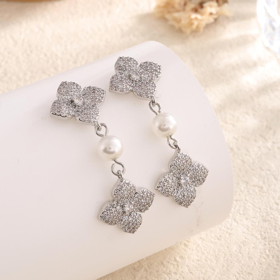 

ZAKOL New Shiny Micropaved Zirconia Leaf Flower Drop Earring Imitation Zircon Glamor Bridal Earrings Women s Wedding Zircon