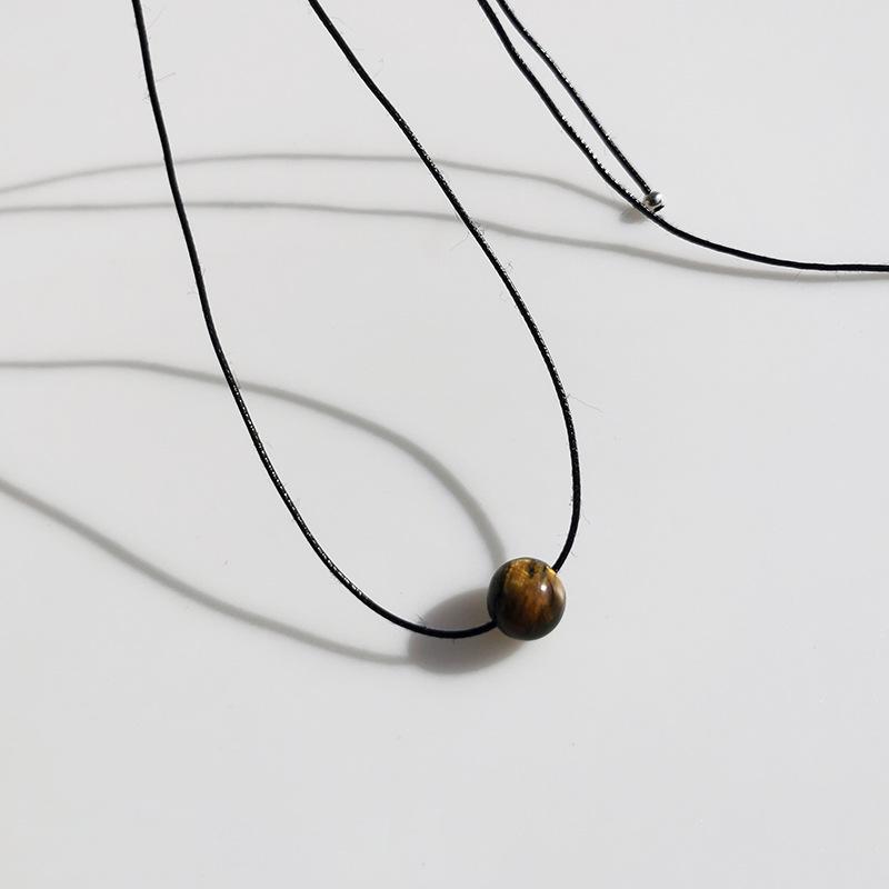 Unisex Retro Geometric Stone Pendant Necklace with Rotating Bead & Leather Cord – Versatile, High-End, Colorfast Design for Women & Men