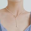 Elegant Pearl Bowknot Tassel Pendant Necklace: High-End Autumn Winter Women's Fashion