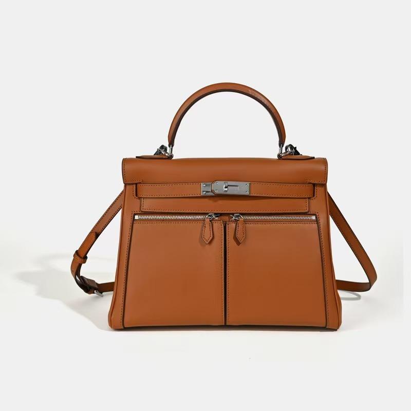 

Cowhide double open zipper handbag women s new shoulder bag large capacity commuter bag light luxury business messenger bag 28*12*22cm золотий коричневий колір