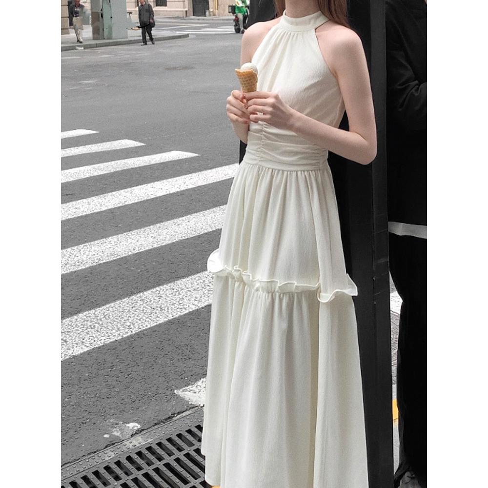 Sleeveless vest neck sling dress seaside vacation thin temperament French long dress women's summer leisure new