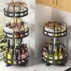 Rotating Kitchen Seasoning Rack: Multifunctional Storage for Oil, Salt, Sauce, and Vinegar in Corner Spaces.