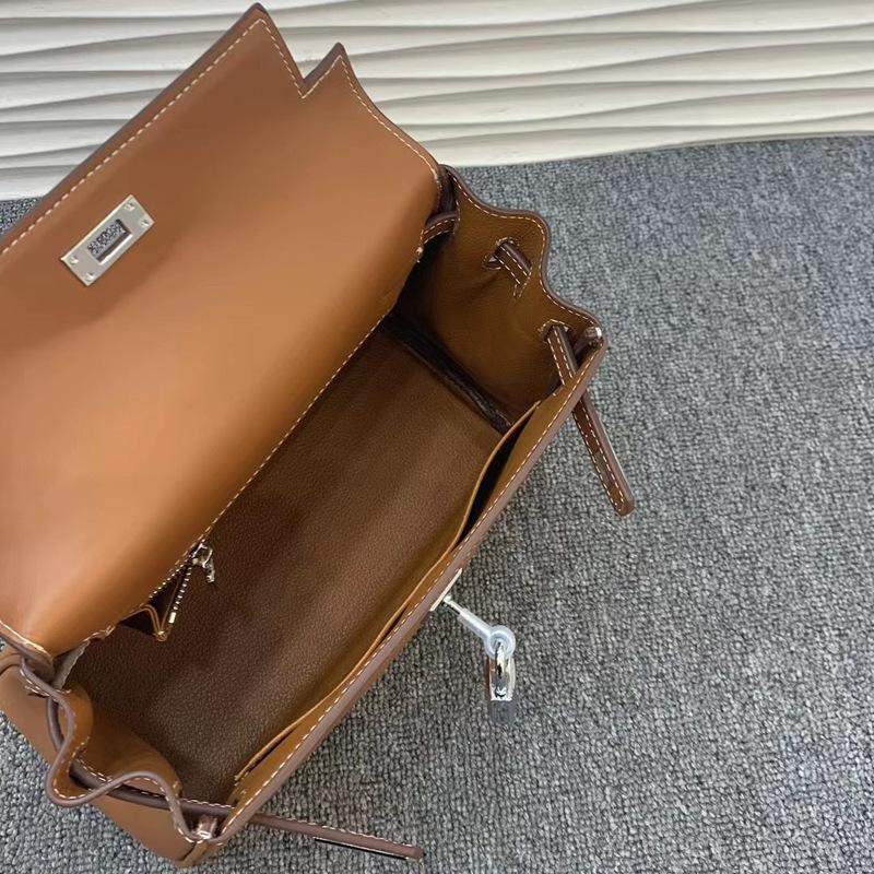 Neue Leder Kelly Tasche Swift Leder breiter Schultergurt atmosphärische Handtasche silberne Schnalle weiches Leder Mode einfache Umhängetasche