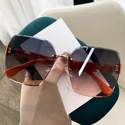 Occhiali da sole di lusso leggeri alla moda di fascia alta senza montatura Little Red Book Tiktok Net occhiali da sole rossi anti-sole