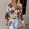 Women's Off-White V-Neck Knit Sweater with Blue Floral Pattern and Lace-Up Sleeve Detail