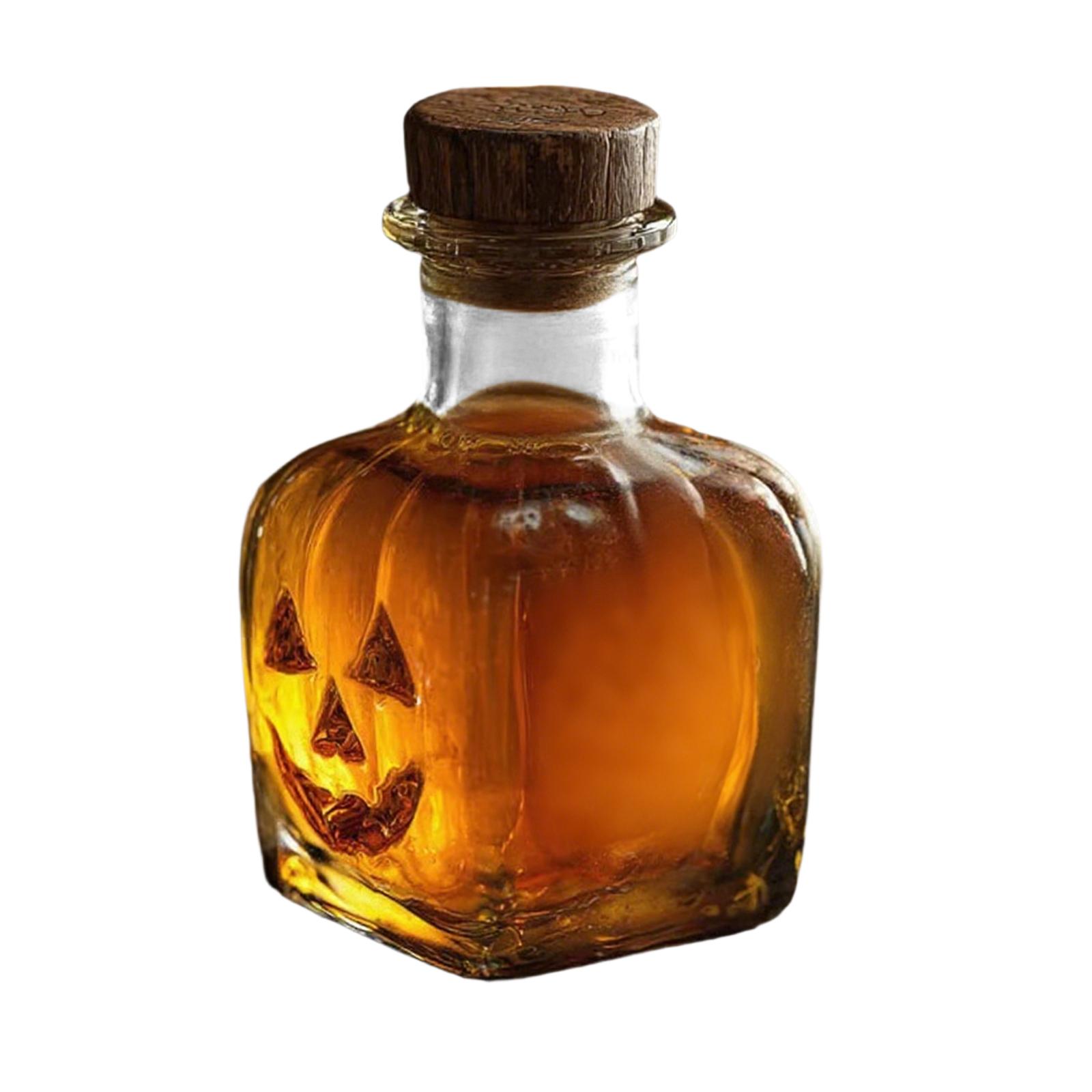 

Crafted To Resemble An Aged Glass Bottle Glowing With Ember-like Warmth, Each Piece Features A Carved Face That Flickers With Mischief And Mystery. One Size