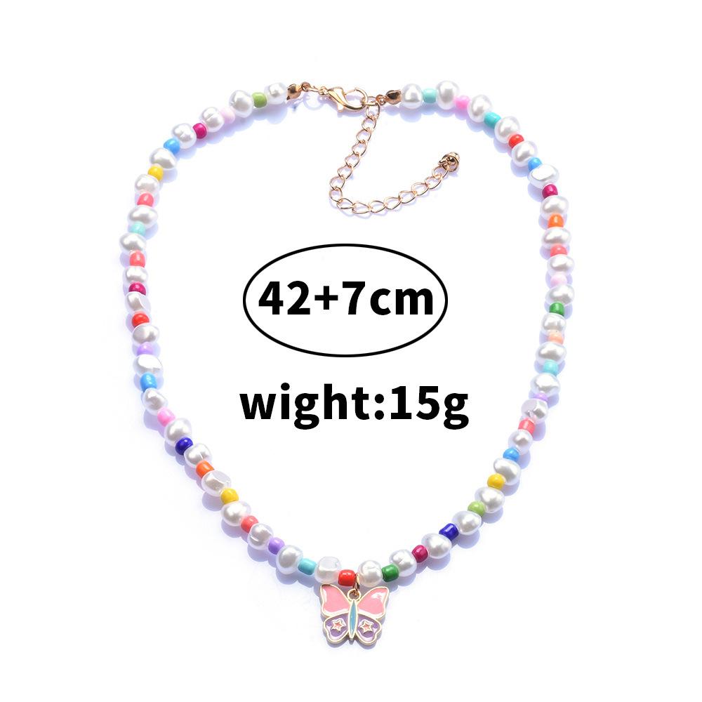Boho Jednoduchý Barevný Náhrdelník z Rýžových Korálků, Etnický Styl Kontrastní Barvy Motýlí Přívěsek Perlový Náhrdelník