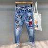 Trendige koreanische Slim-Fit Jeans mit Graffiti-Print für Herren