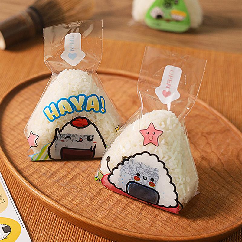 50 ks Kreslený pro trojúhelníkový obal na rýžovou kouli Nori Onigiri Sushi sáček se 2 formičkami na onigiri a 50 nálepkami Forma na výrobu sushi