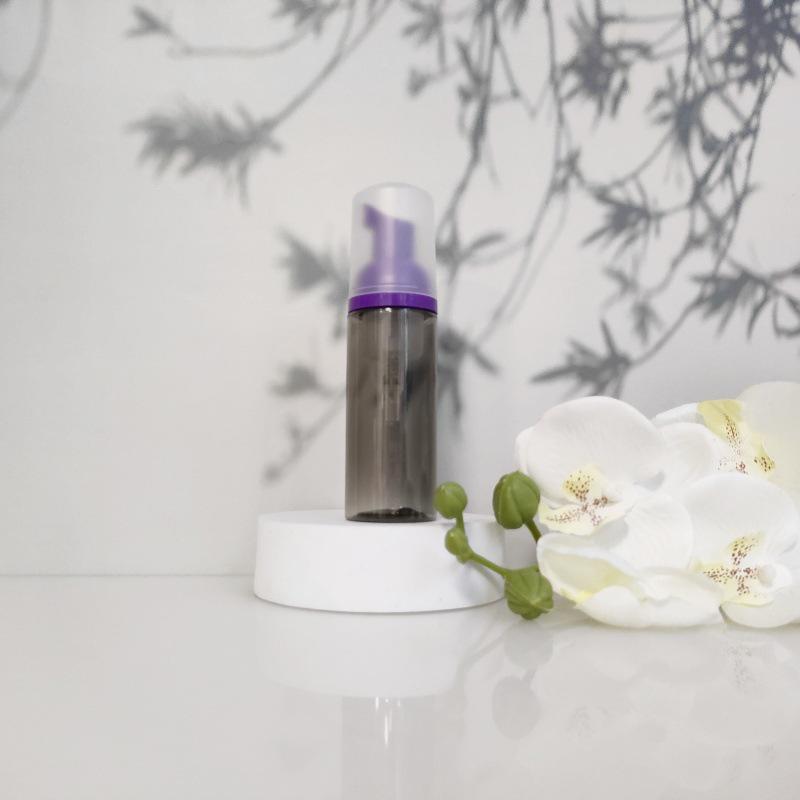 Available 60ml Transparent Black Foam Mousse Bottle for Face Wash and Travel-friendly Cosmetic Packaging.