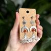 Silver Earrings With Crystal Moon And Sun Pendant For Women