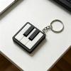 Llavero de Mini Piano, Clicker de Teclas de Piano, Piano Táctil Tocable Juguete para Aliviar el Estrés con Anilla Metálica, Teclas Clásicas Blanco y Negro para Amantes de la Música Y