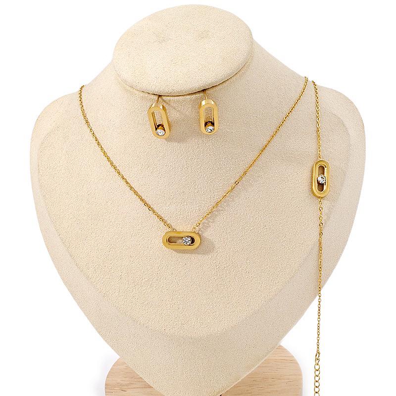 Gold-Plated Titanium Steel Jewelry Set: Necklace, Bracelet, Earrings with Geometric Zirconia - Luxurious and Versatile for Women