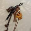 Koreanischer Stil Brottüten-Anhänger Herbst-Winter Schlüsselanhänger-Schmuckstück Geflochtene Seil-Taschenanhänger Lauge-gebundenes Brot Multifunktion