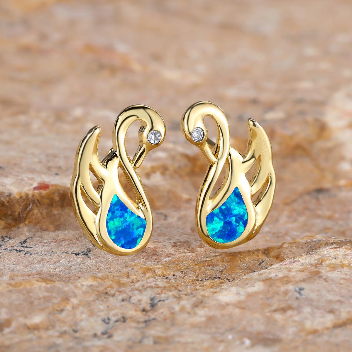 Модные серьги-лебеди с кристаллами циркона — фото 8