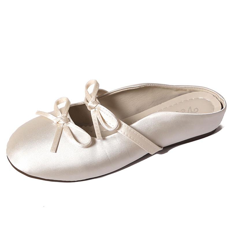Wear half slippers outside and increase the height inside. Summer new gentle single shoes bow cool slippers women