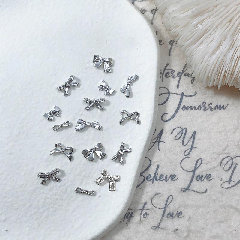 50/100Pcs Silver Metal Bows Nail Art Charm 3D Alloy Silver/Gold Bowknot Ribbon Nail Decor Parts Diy Luxury Manicure Accessories