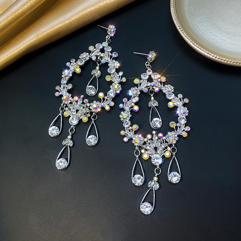 

Exquisite Hollow Floral Design Earrings: Stylish Bridal Accessories for Women