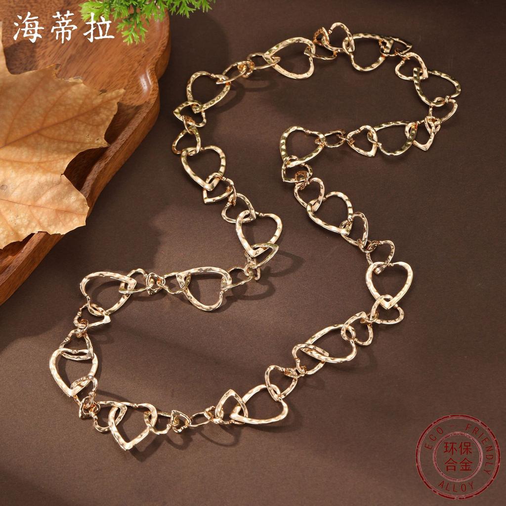 New exaggerated hollow love ring long necklace, women's fashion high-end heart-shaped sweater chain