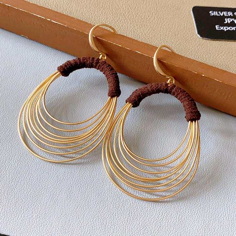 European and American exaggerated circle winding multi-layer ear hook fashion personality cold wind earrings niche unique earrings women