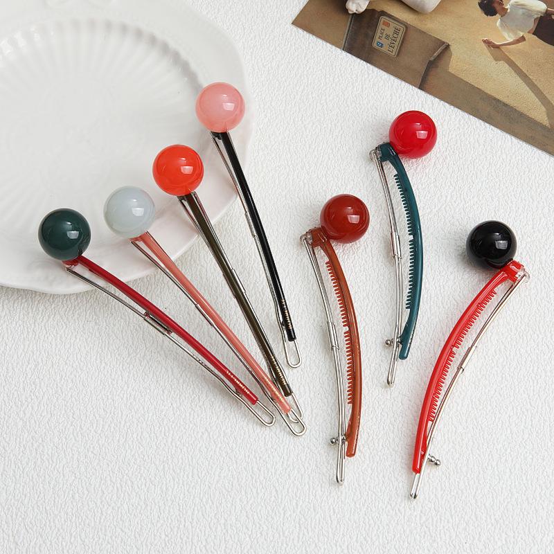 2024 Trend: Round Ball Acrylic Lollipop Hair Clip – Simple, Celebrity-Style Accessory