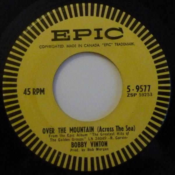 

7inch Record BOBBY VINTON - Over The Mountain (Across The Sea) 59577 Epic 1963 Canada Pop Used